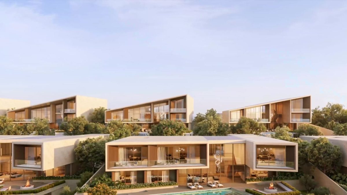 Villas stepping down a landscaped hillside, each with a terrace and a pool