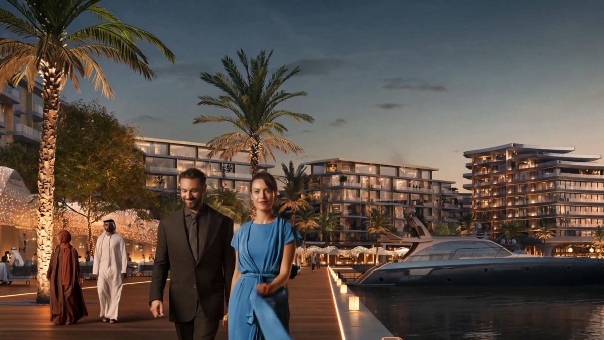 Evening at the marina: a boardwalk, a motor yacht at its berth and residential buildings behind the palms